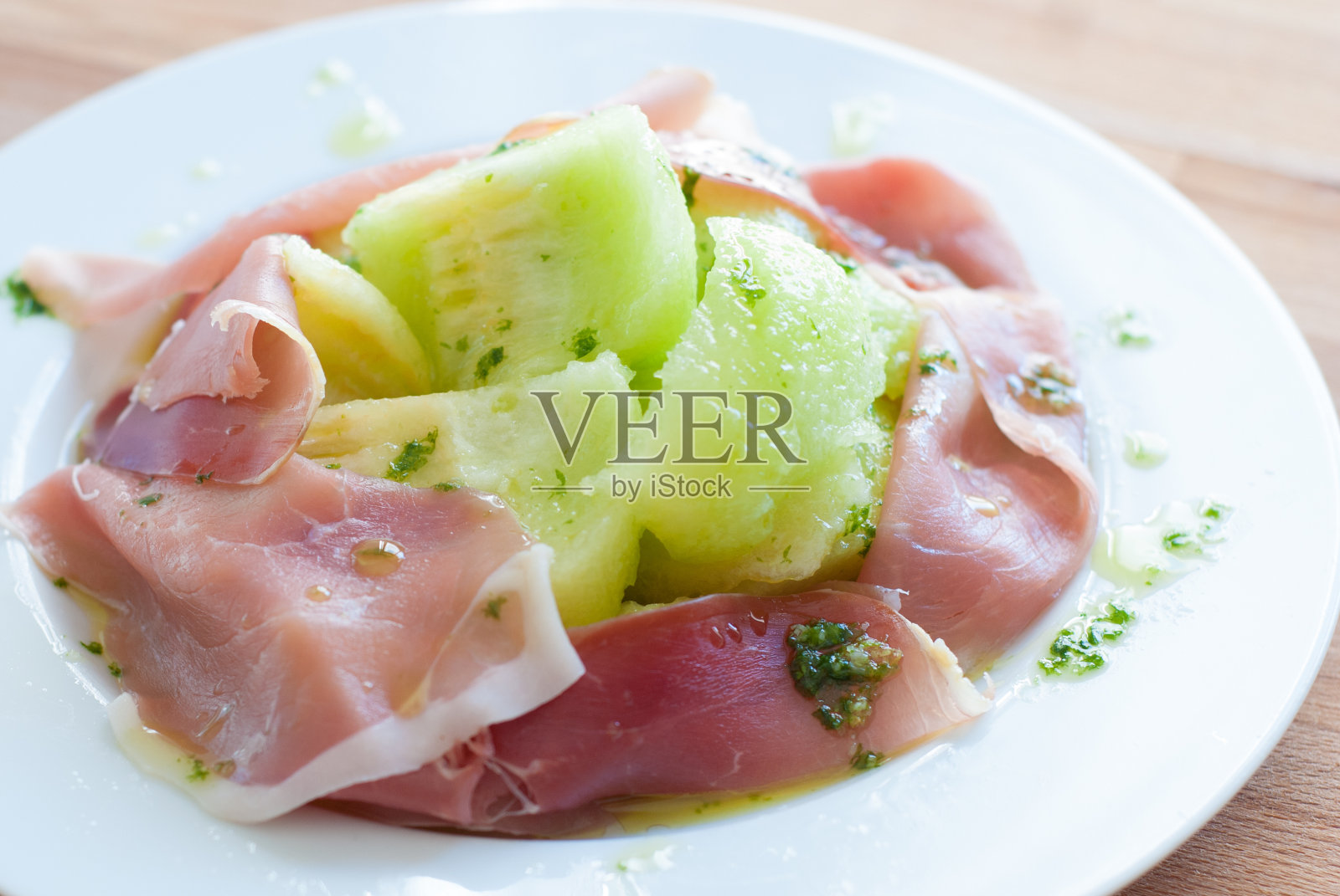 西瓜配火腿和甘菊?这照片摄影图片