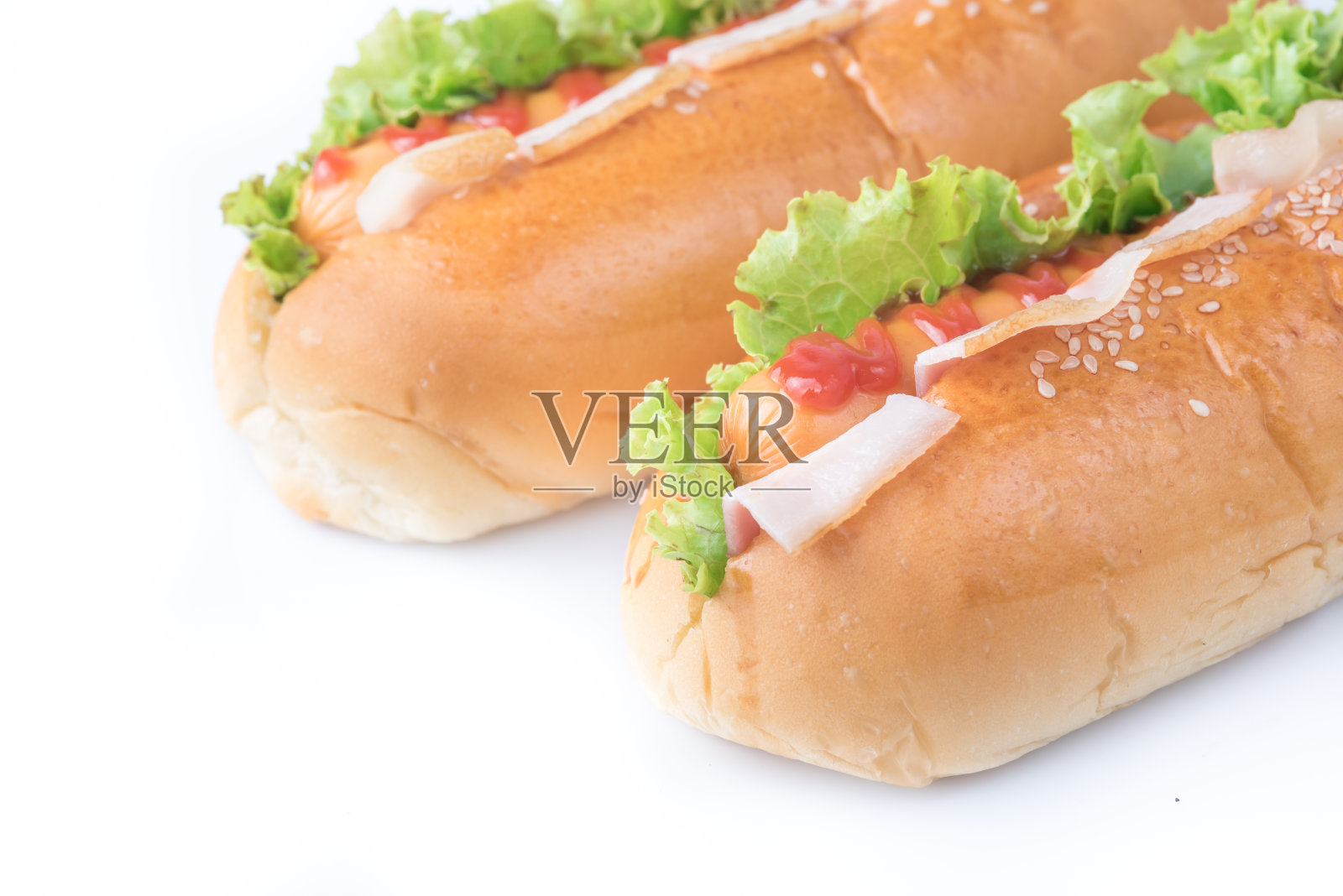 快餐，热狗，各种配料的白色背景照片摄影图片