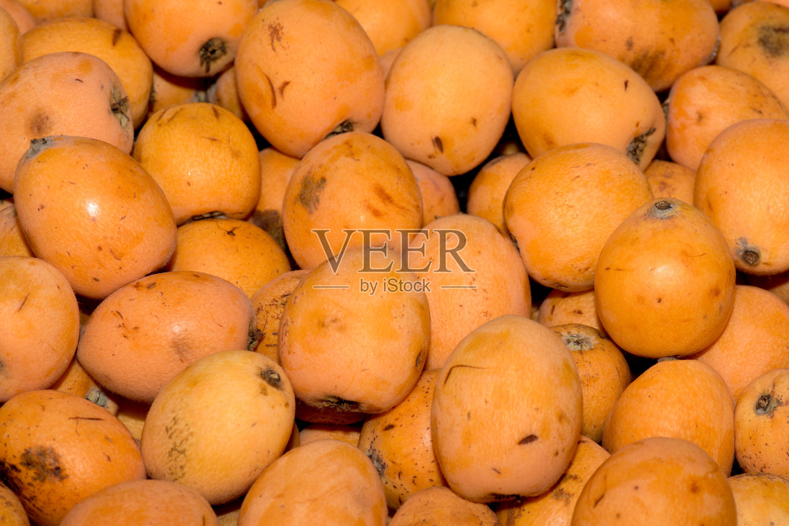 市场出售的新鲜枇杷照片摄影图片