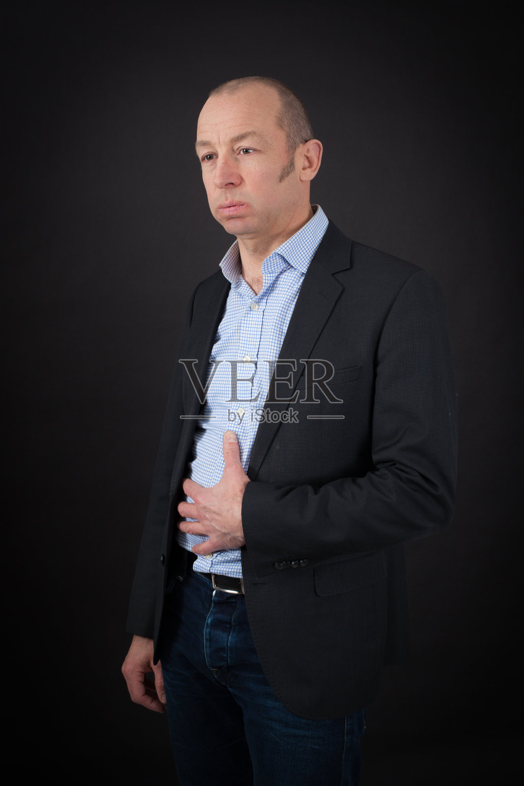 英俊的男人在不同的衣服做不同的表情照片摄影图片