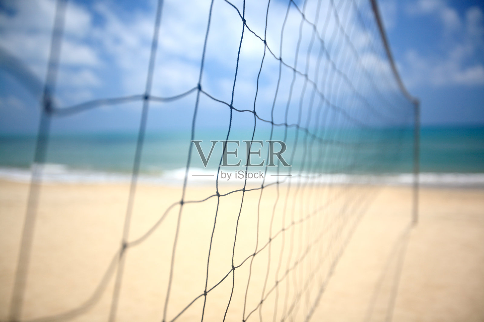 沙滩上的排球网照片摄影图片