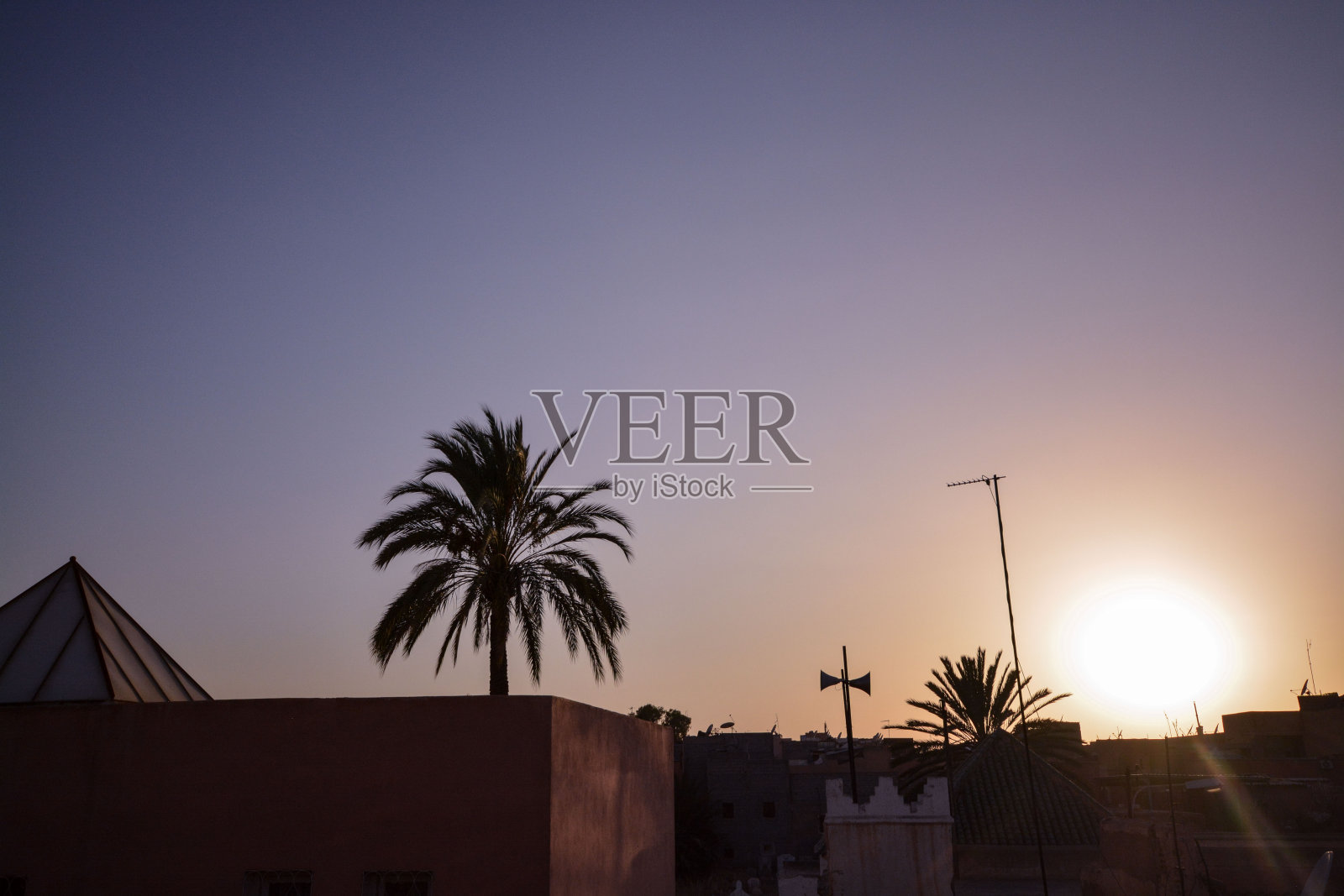 摩洛哥马拉喀什的日落照片摄影图片