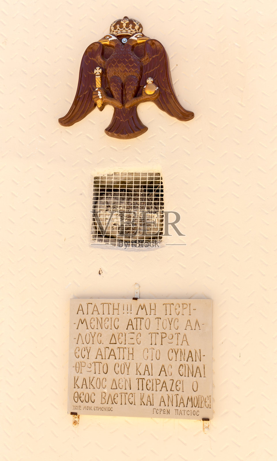 希腊克里特岛的盾形纹章和希腊宗教象征照片摄影图片