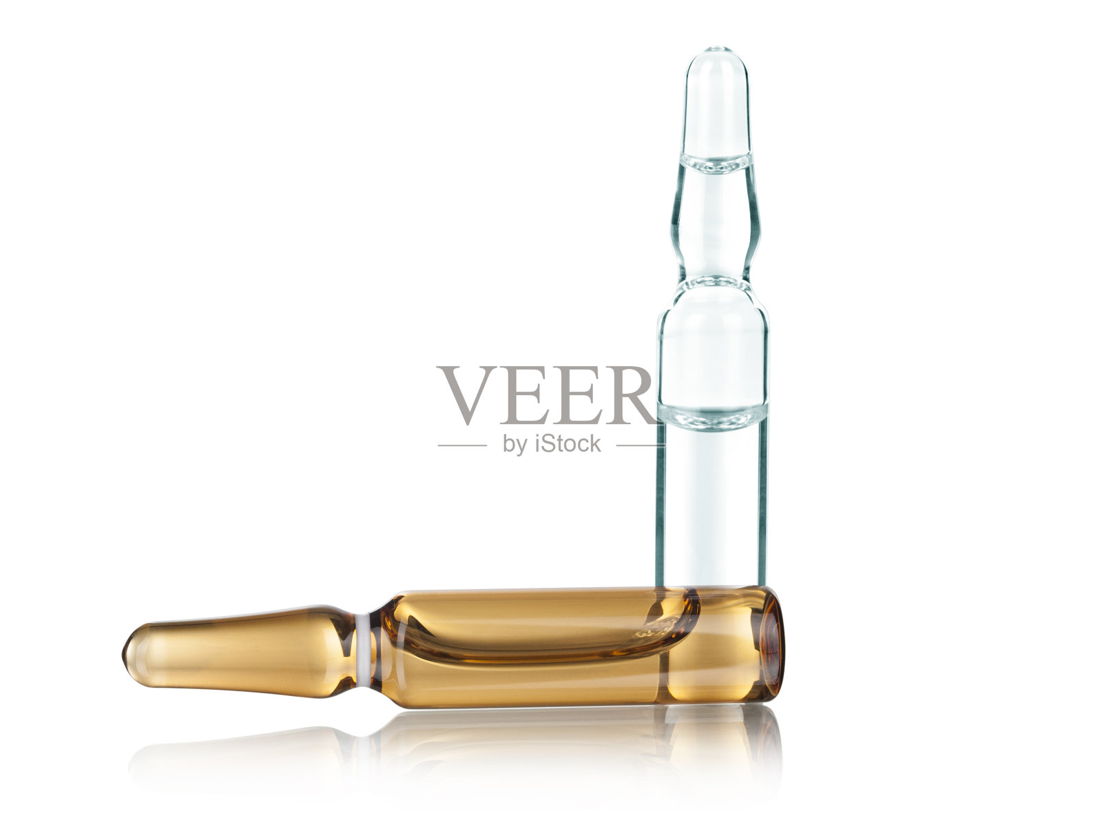 透明和黄色的医用安瓿在孤立的白色背景上照片摄影图片