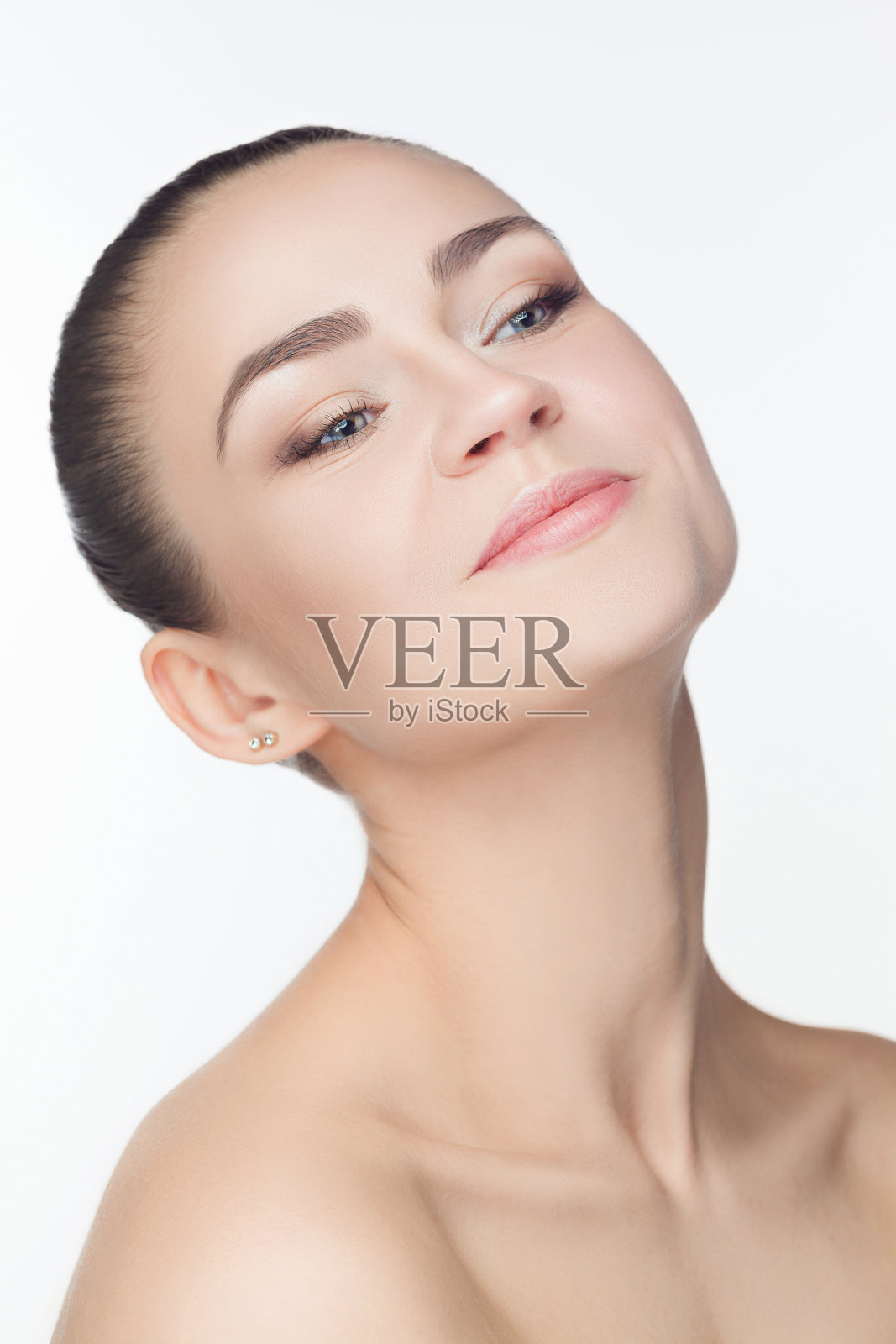 美丽的女孩的脸。完美的肌肤照片摄影图片