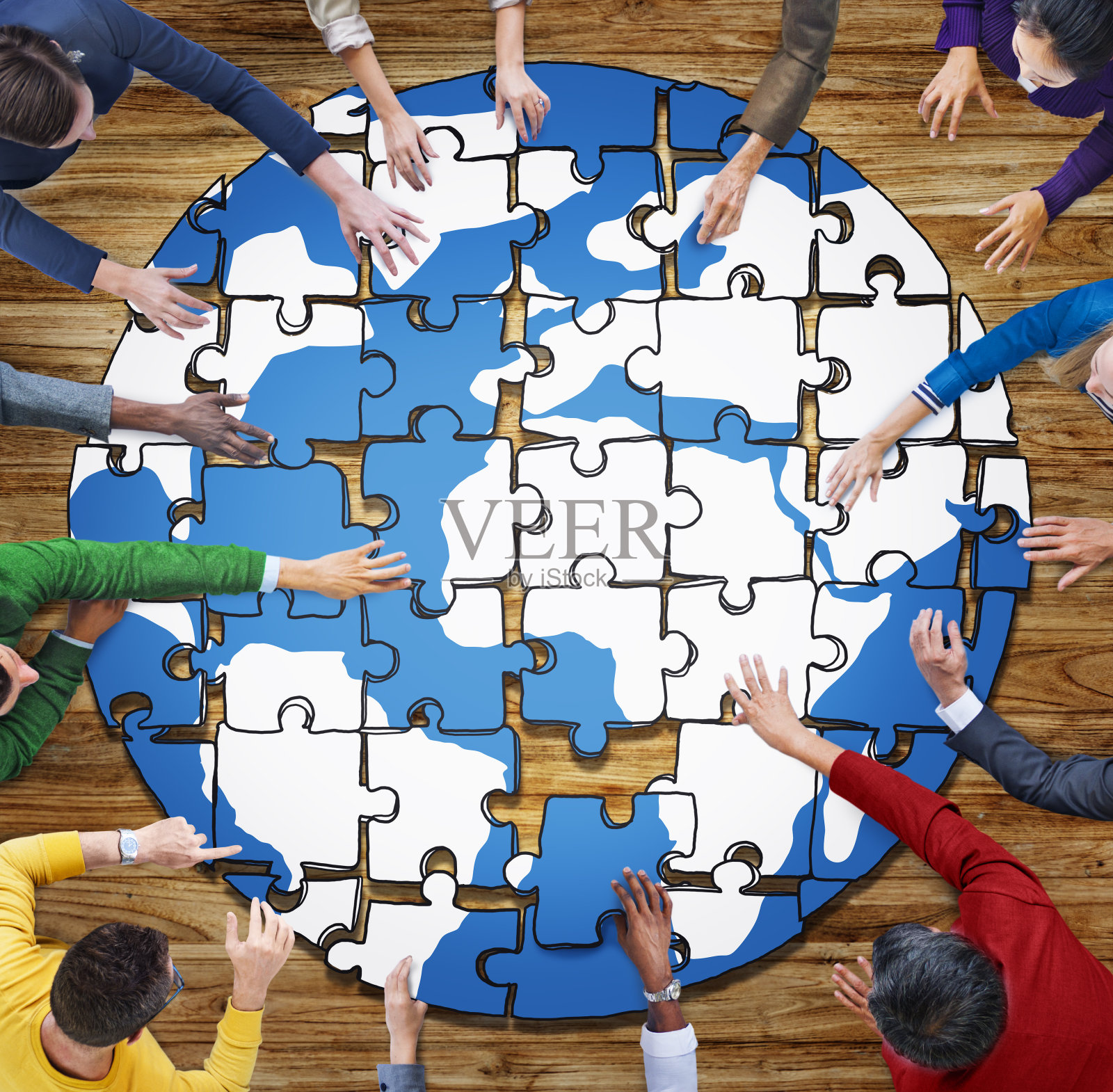 在照片和插图中拼图形成地球的人照片摄影图片