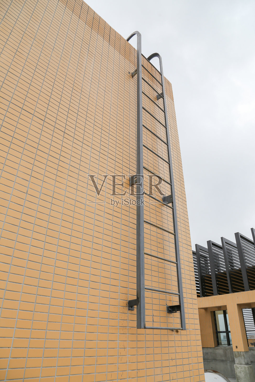 墙上的梯子照片摄影图片