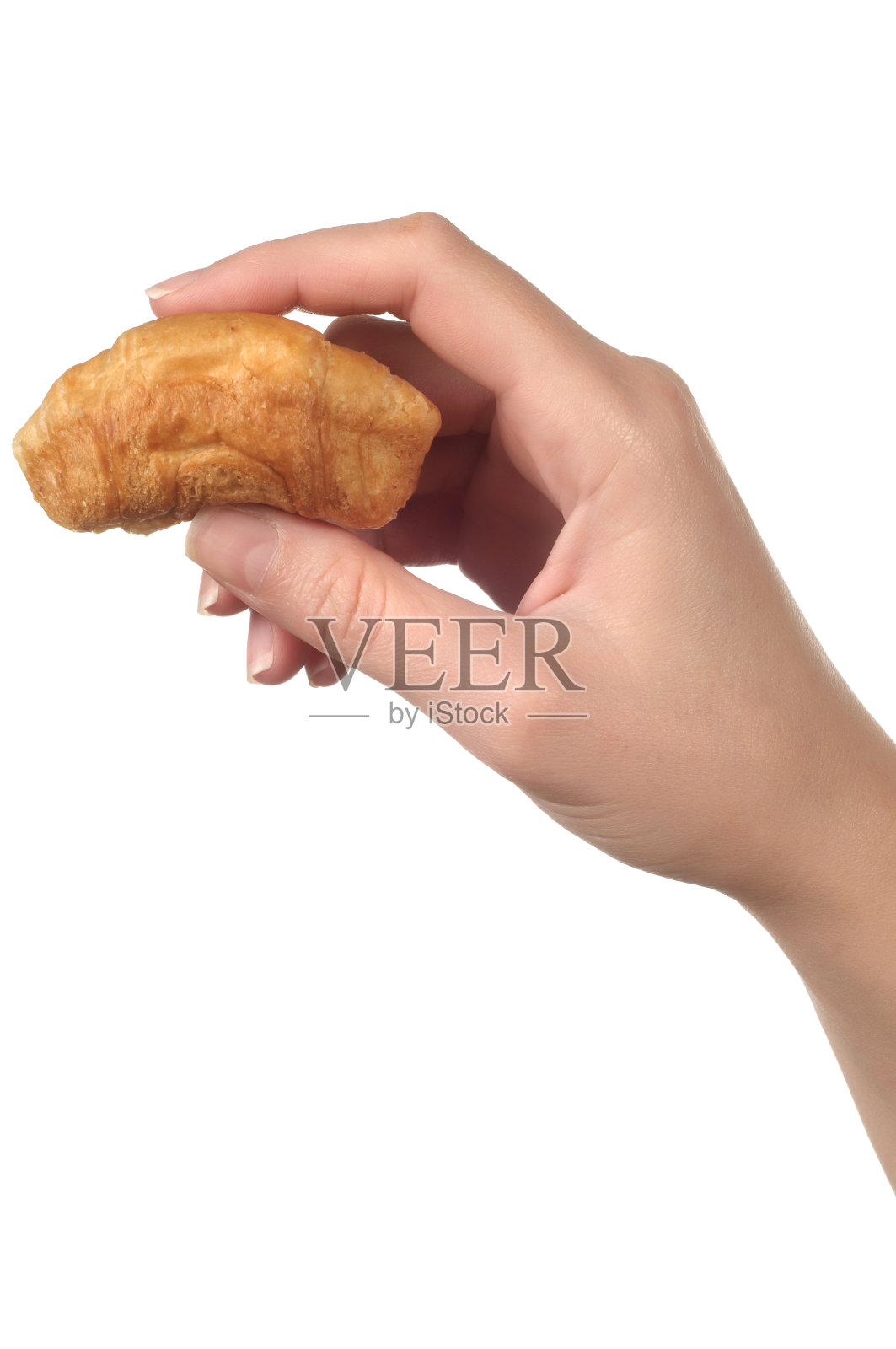 女人手里拿着新鲜美味的羊角面包卷照片摄影图片