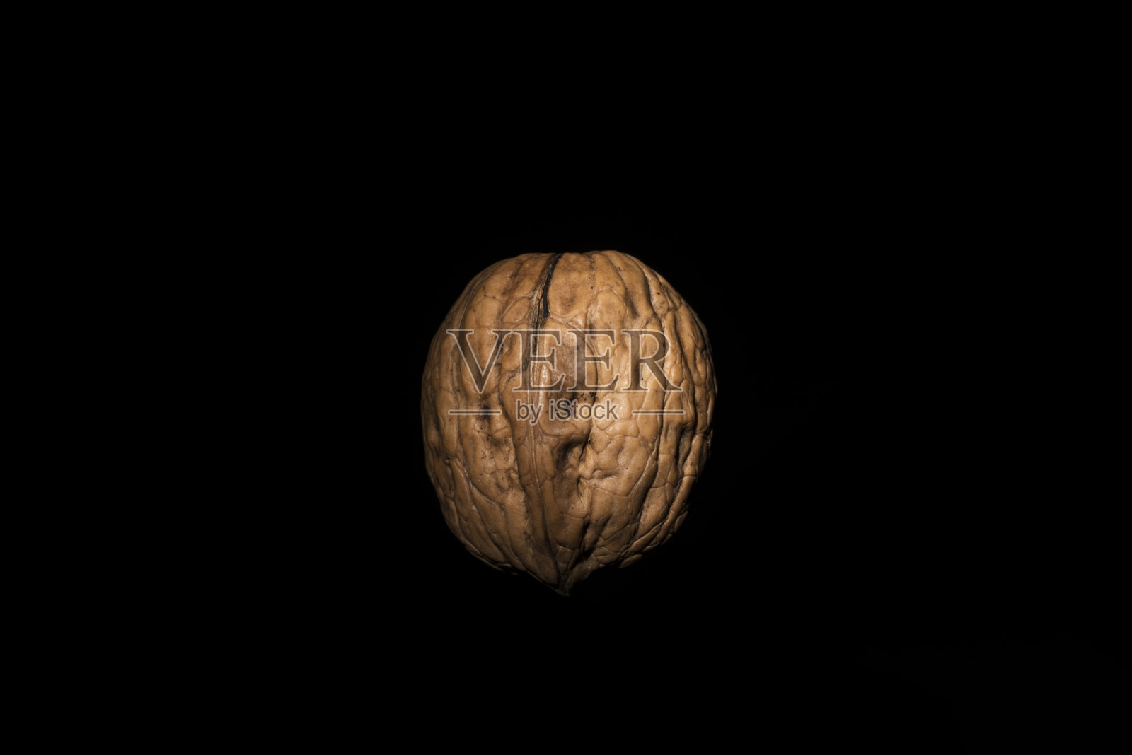 坚果与黑色背景照片摄影图片