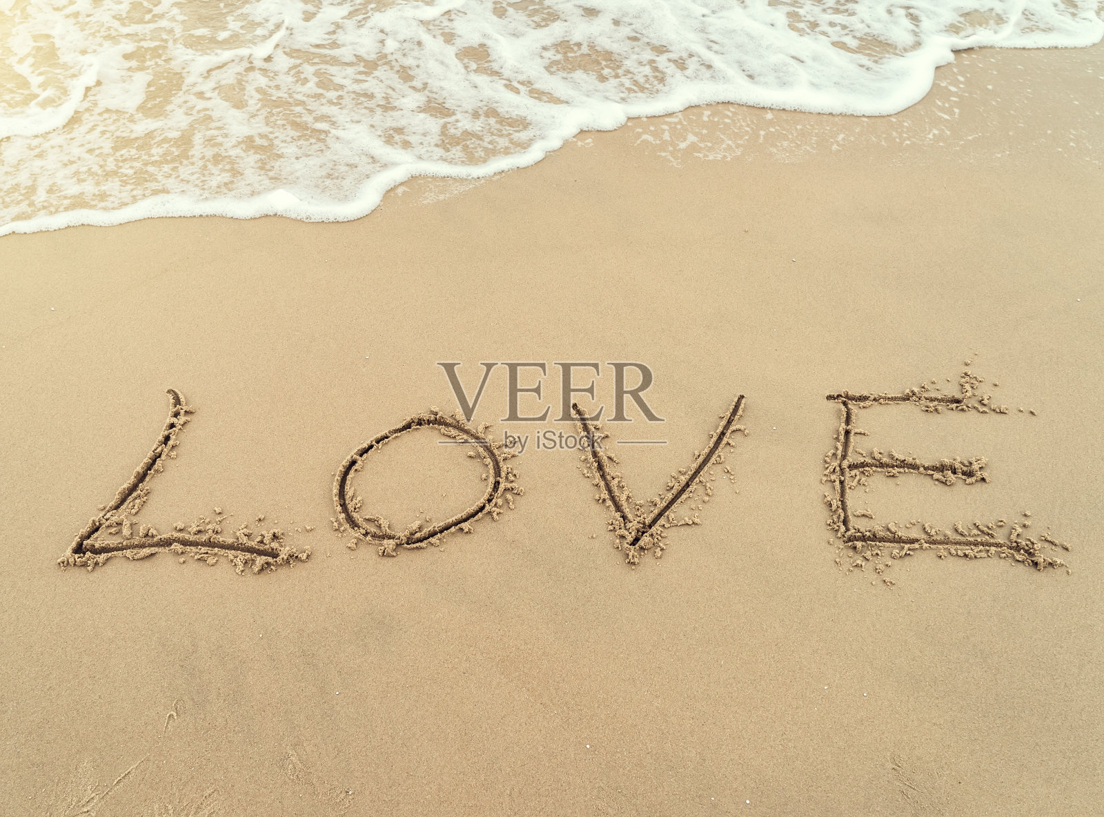 爱你在沙子里照片摄影图片