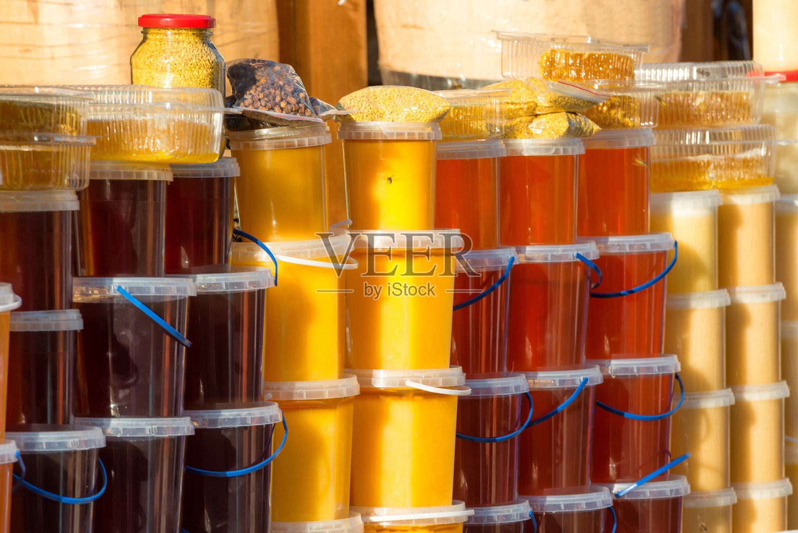许多蜂蜜罐照片摄影图片