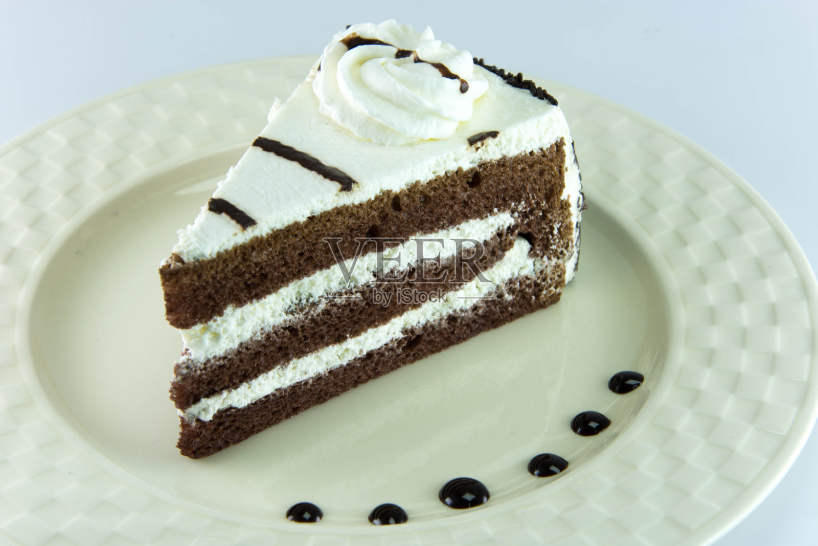 白底热茶，蛋糕。照片摄影图片