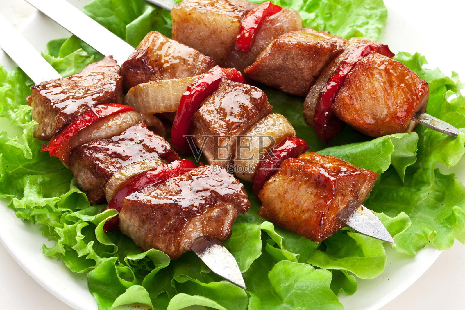 烧烤烤肉串羊肉串。照片摄影图片