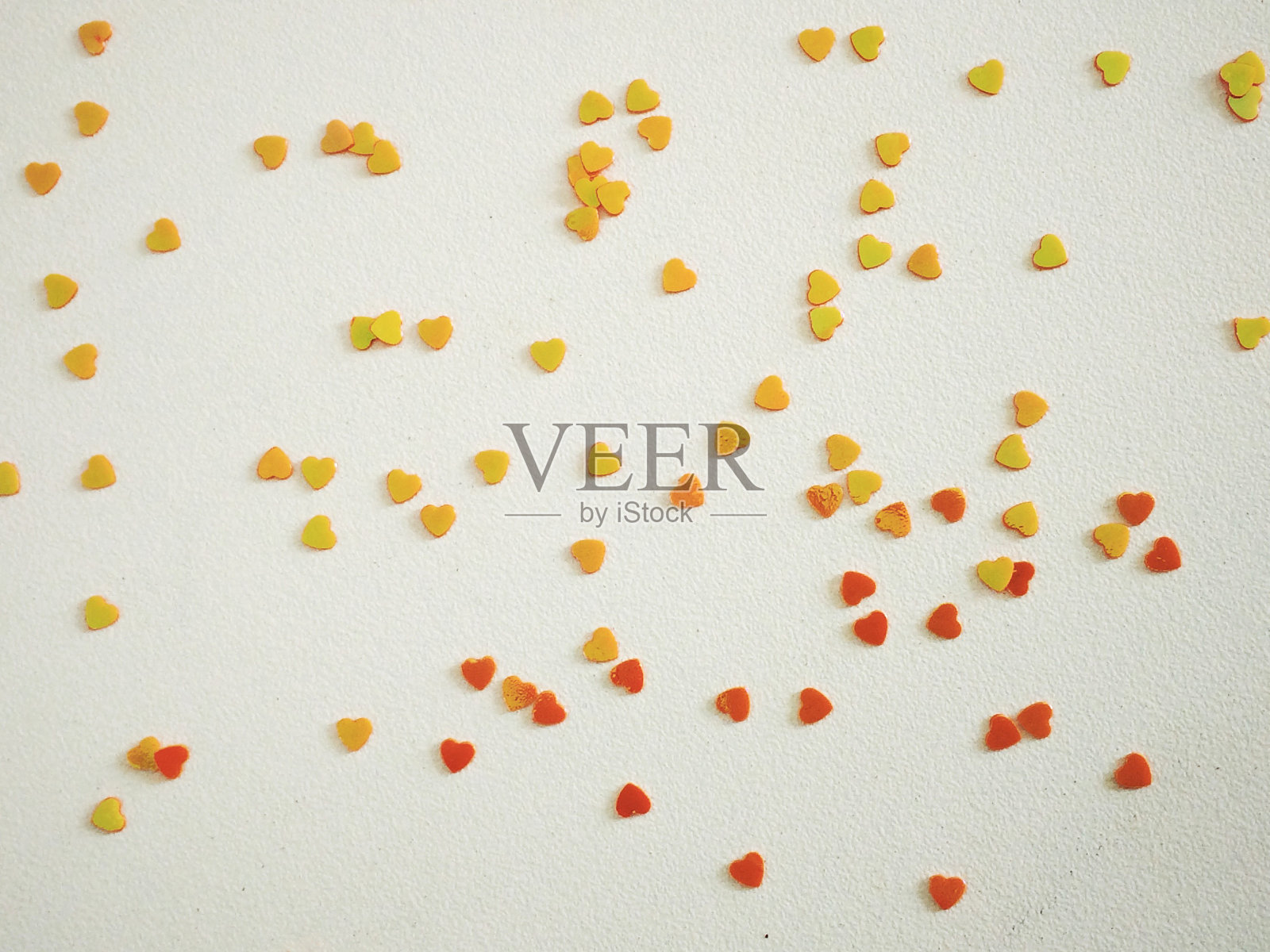 橙色和粉色的心形糖果照片摄影图片