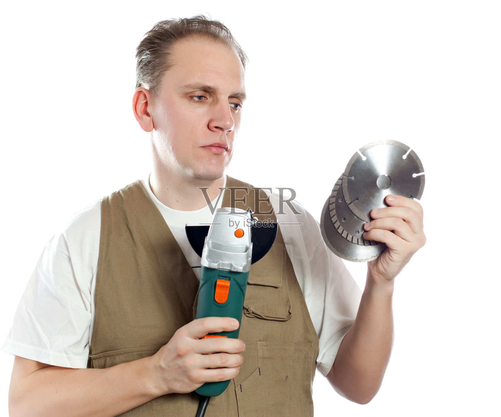 工人选择一个可拆卸的圆盘作为工具照片摄影图片