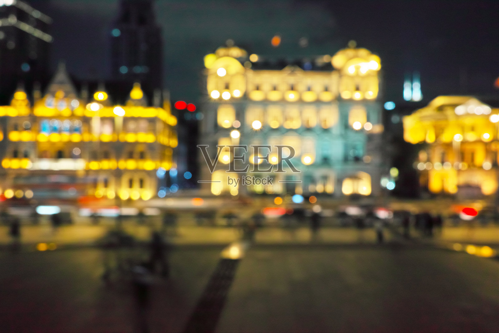 色彩模糊的城市背景。照片摄影图片