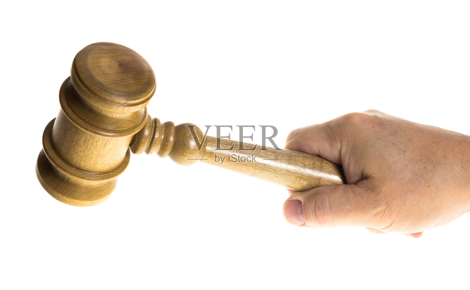 紧握木槌的手照片摄影图片