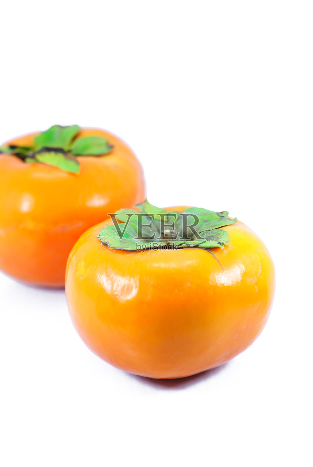 在白色背景上孤立的柿子照片摄影图片