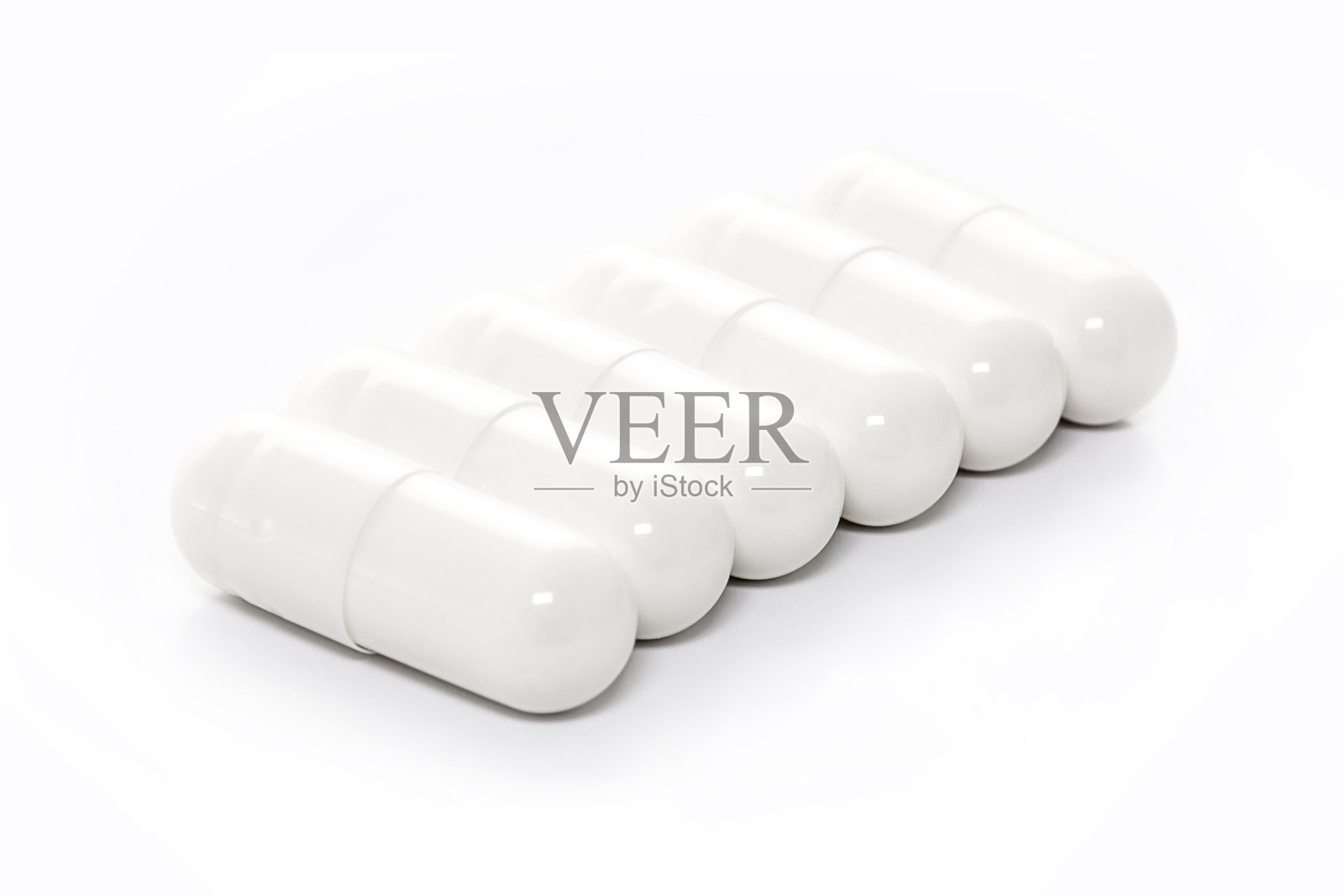 白色药胶囊照片摄影图片