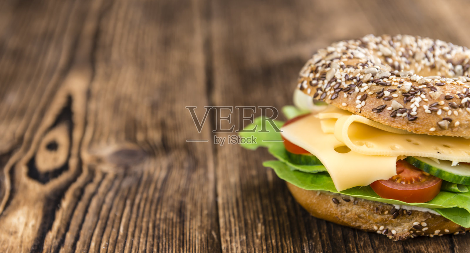 芝士百吉饼(豪达)照片摄影图片