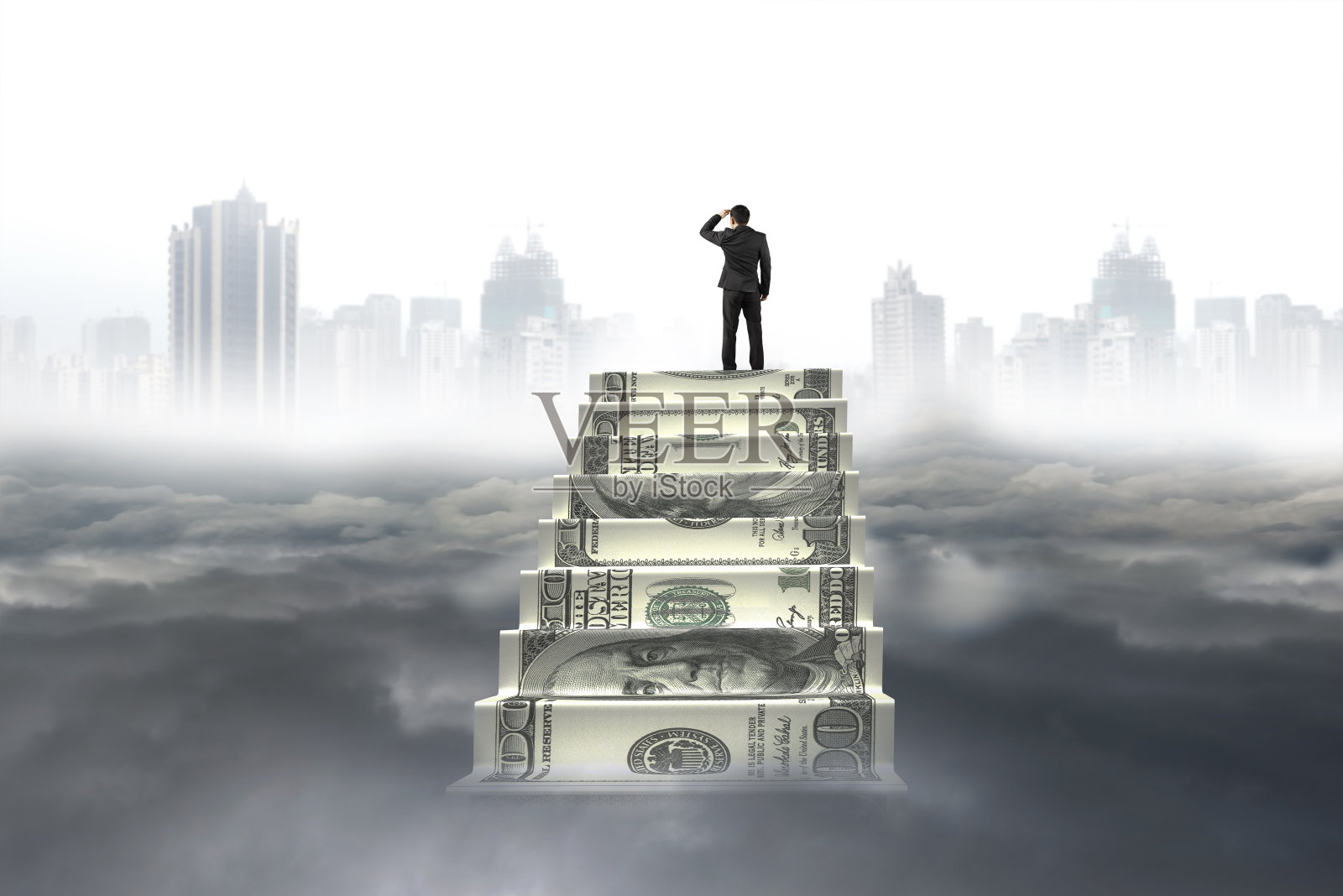 商人在金钱楼梯上看城市景观云景照片摄影图片