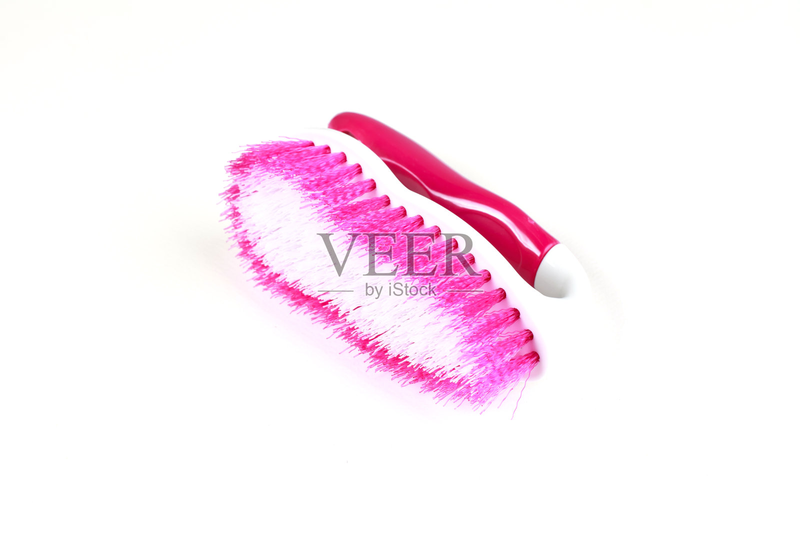 清洁塑料刷刷隔离白色。照片摄影图片