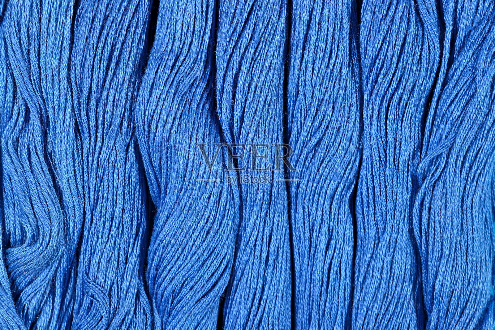 蓝色丝线作为背景纹理照片摄影图片