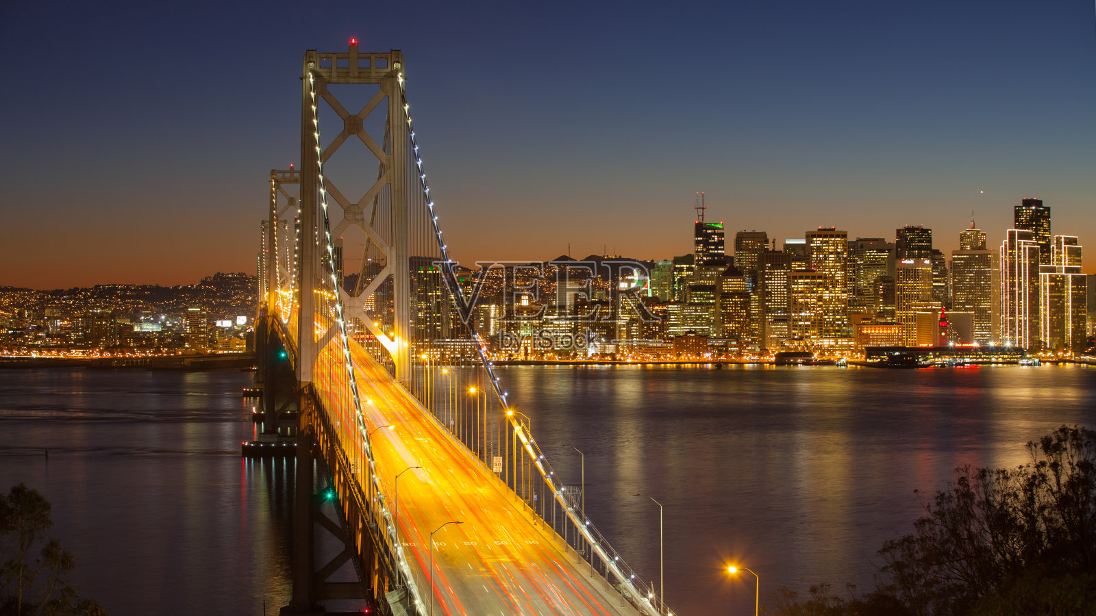 日落时分的旧金山海湾大桥照片摄影图片