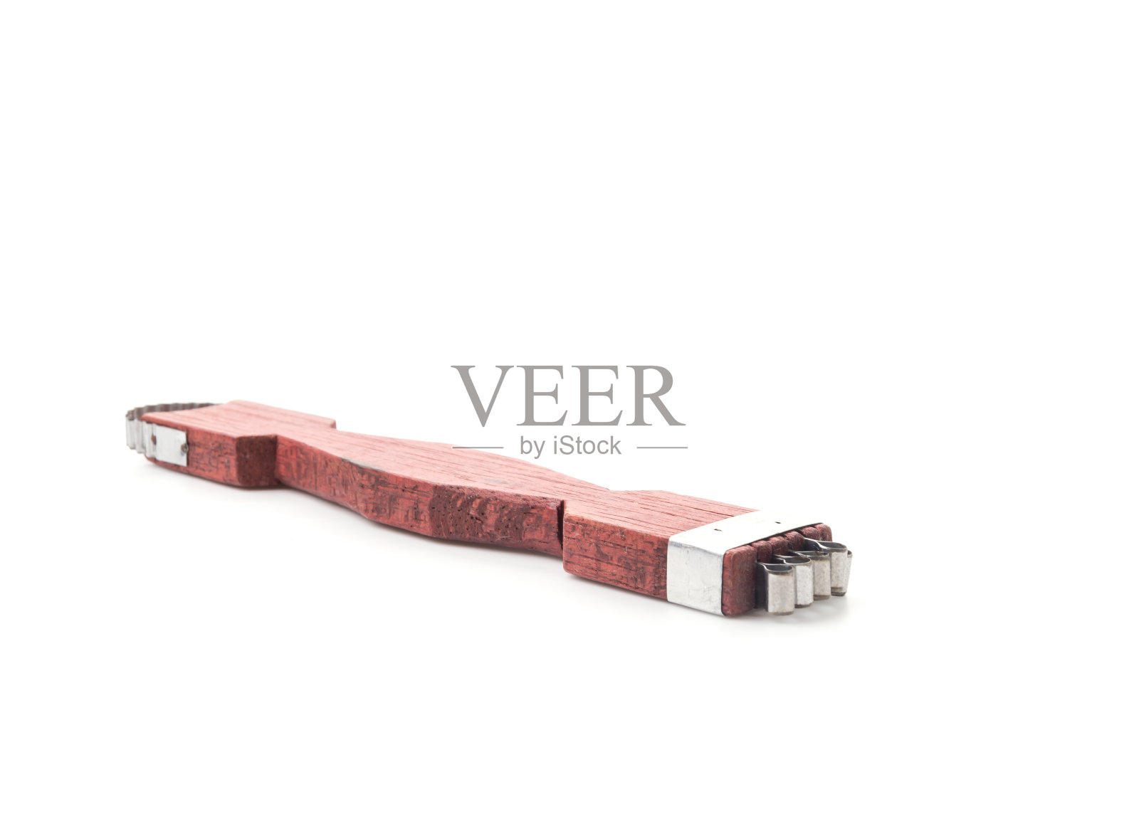 白色背景上的椰子磨碎器照片摄影图片