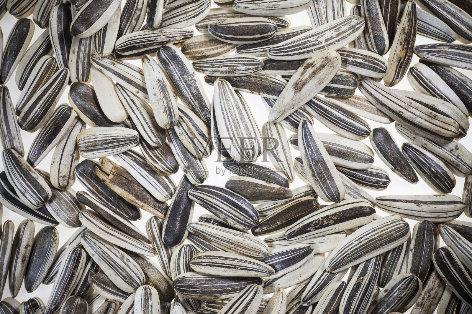 葵花籽的背景。照片摄影图片