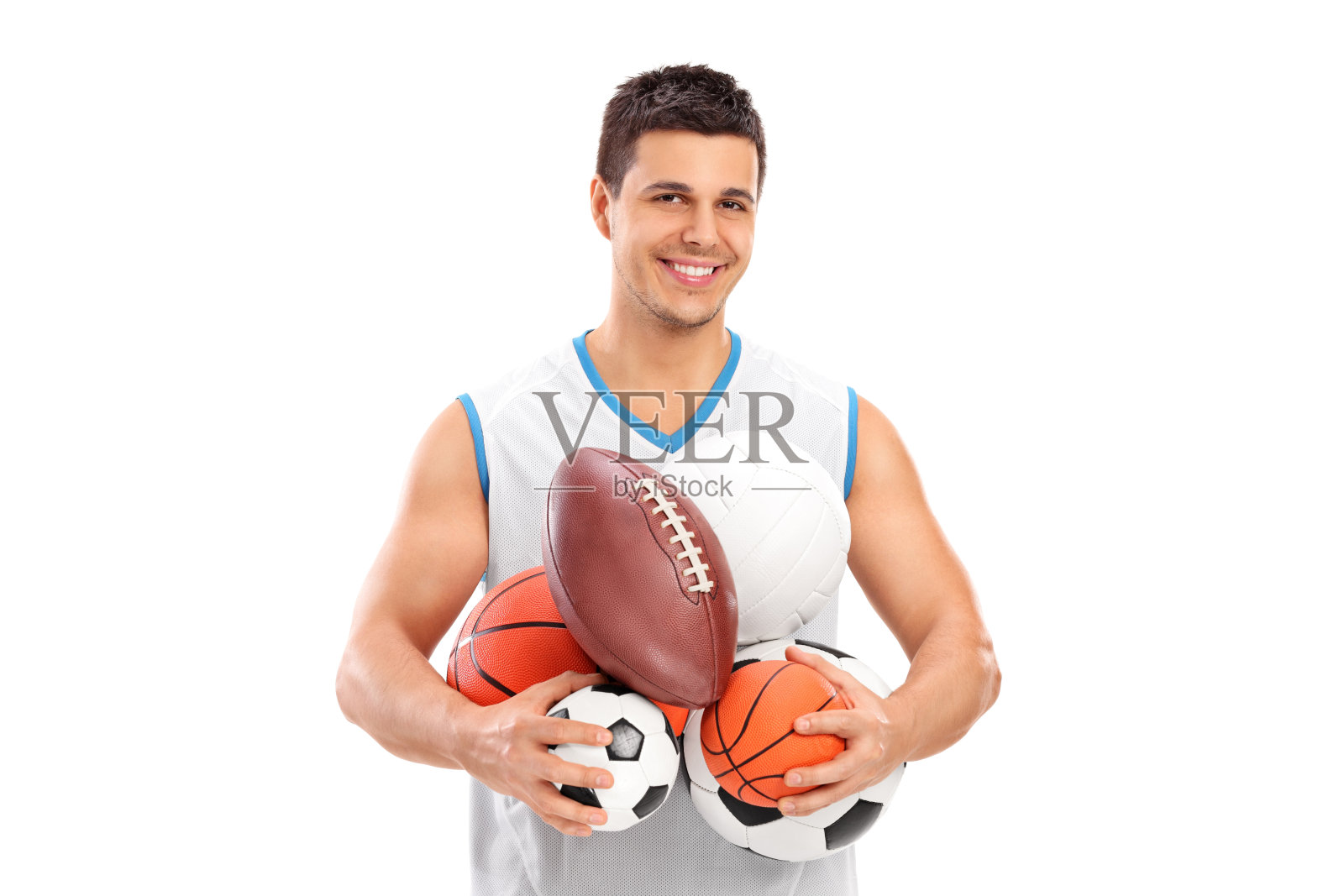 运动员拿着一堆不同种类的球照片摄影图片