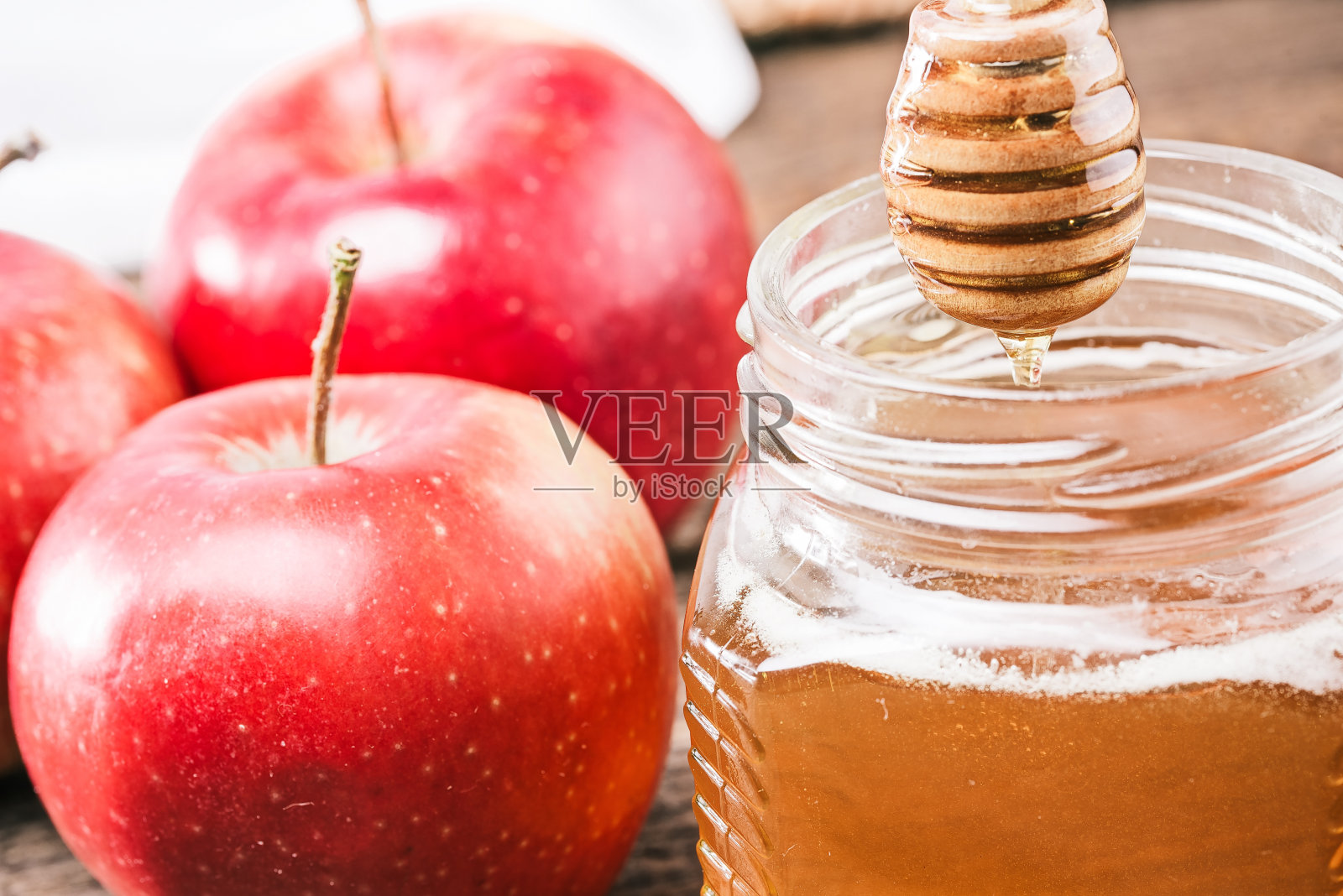 苹果和蜂蜜照片摄影图片