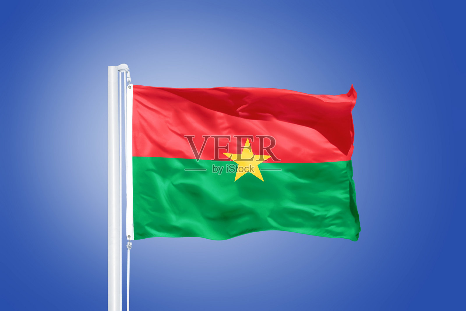 蓝天下飘扬的布基纳法索国旗照片摄影图片