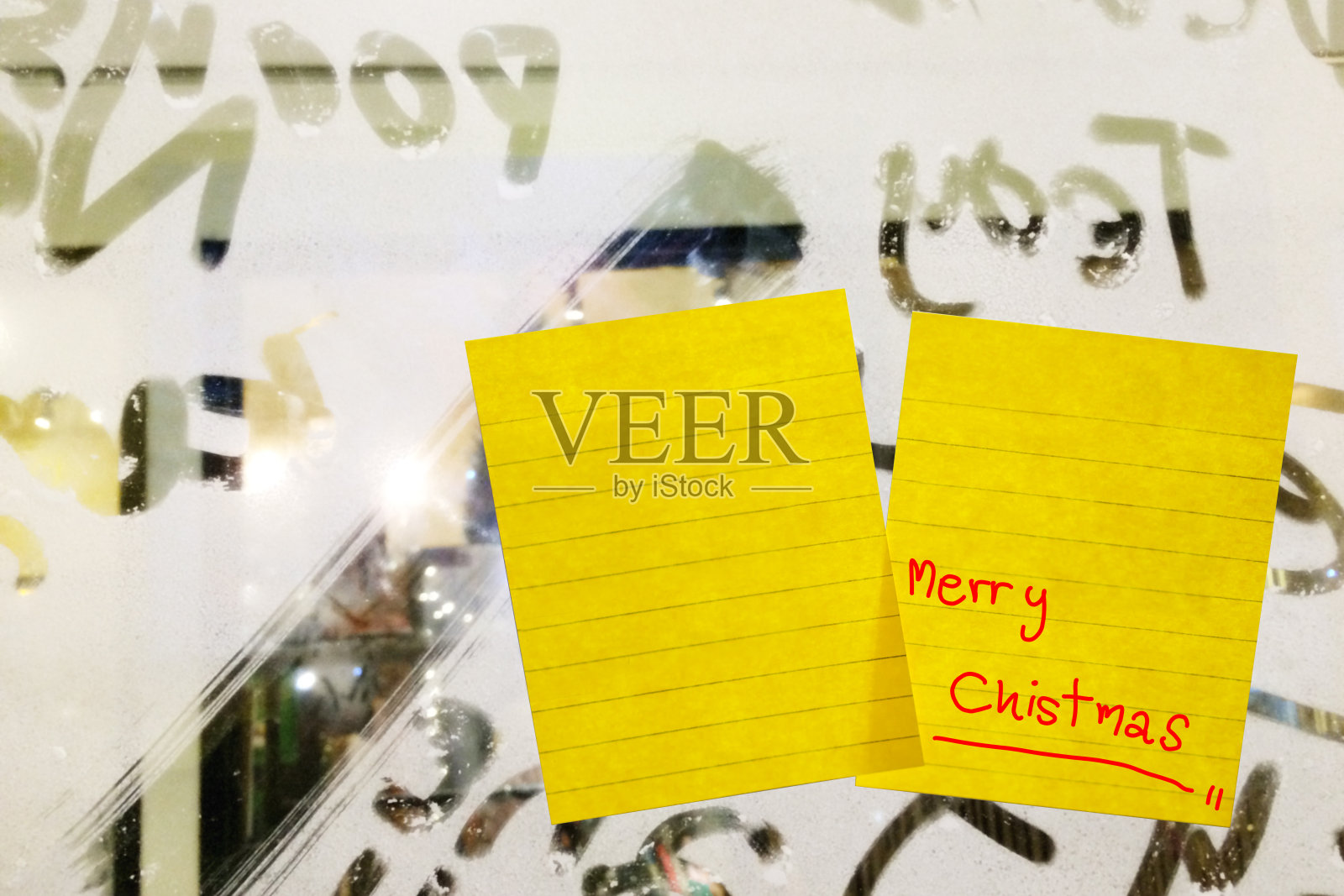 圣诞快乐字贴在窗玻璃上照片摄影图片