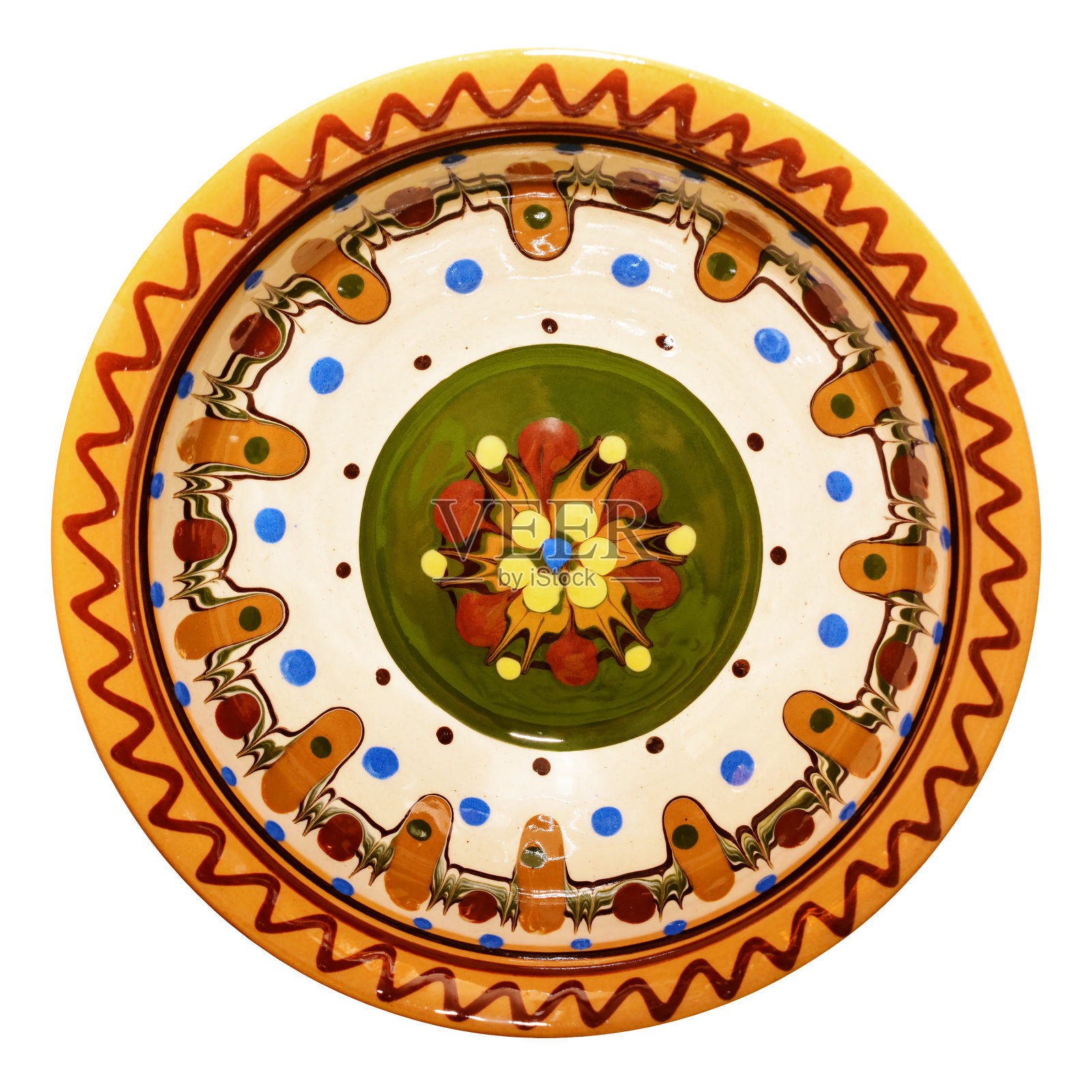 传统的彩色陶器。画陶瓷板。照片摄影图片