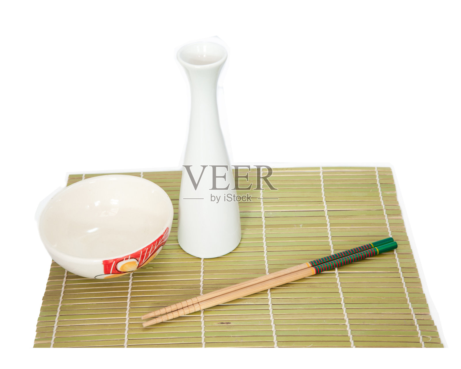筷子和碗放在竹席上照片摄影图片