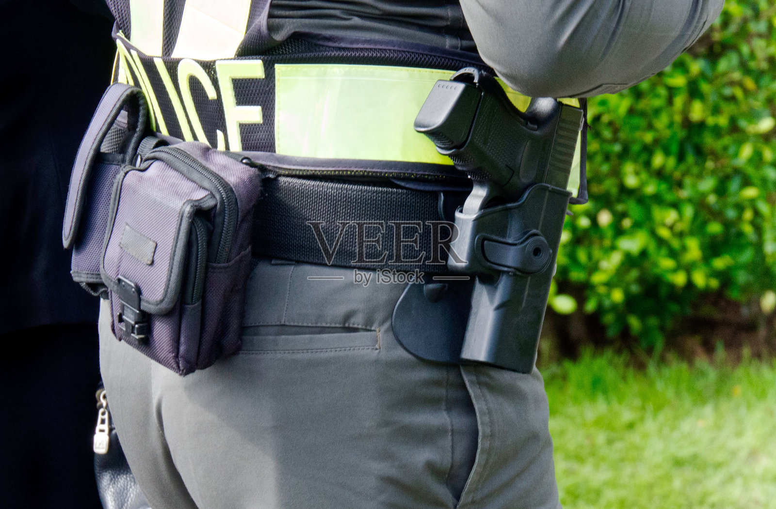 特写:警察的皮带和齿轮照片摄影图片