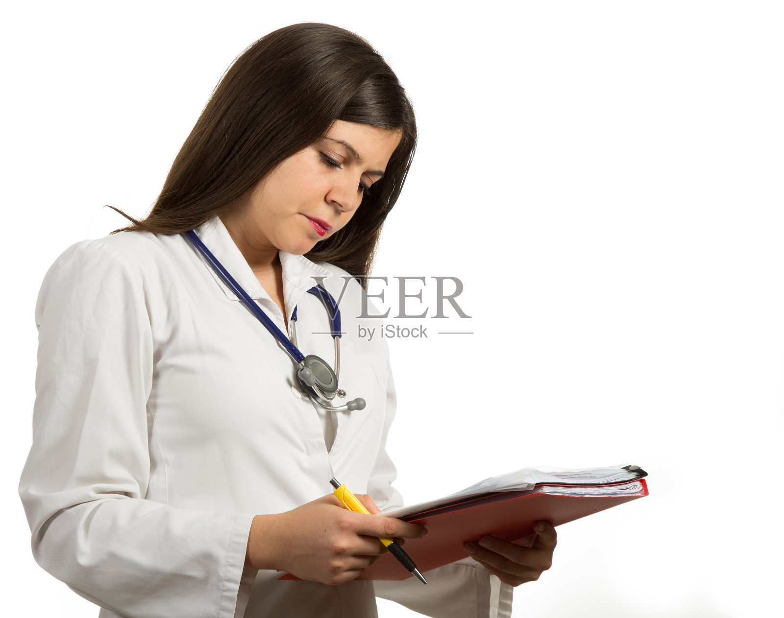 年轻女医生的肖像看起来很严肃照片摄影图片