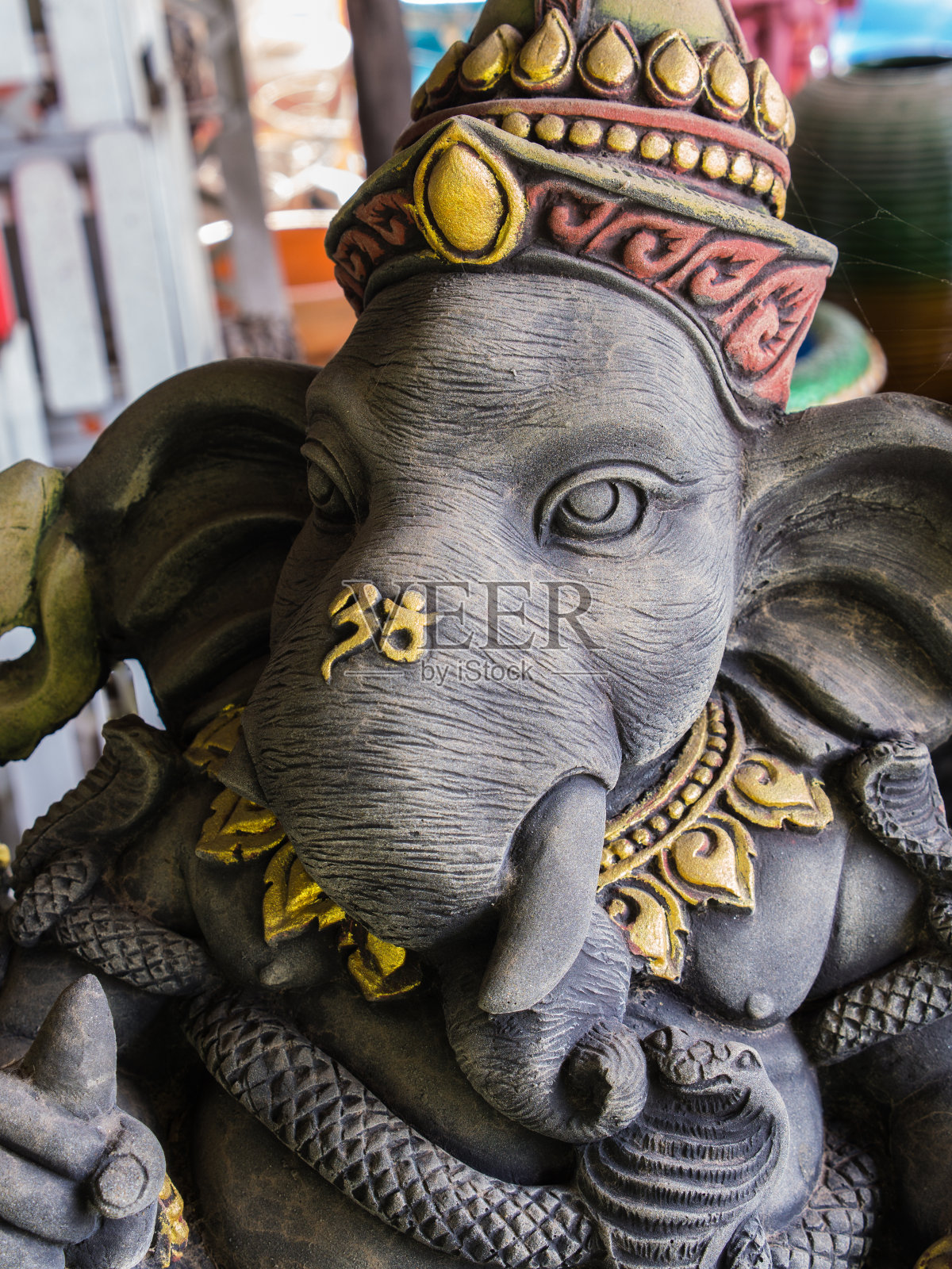 不同姿势的象头神雕像照片摄影图片