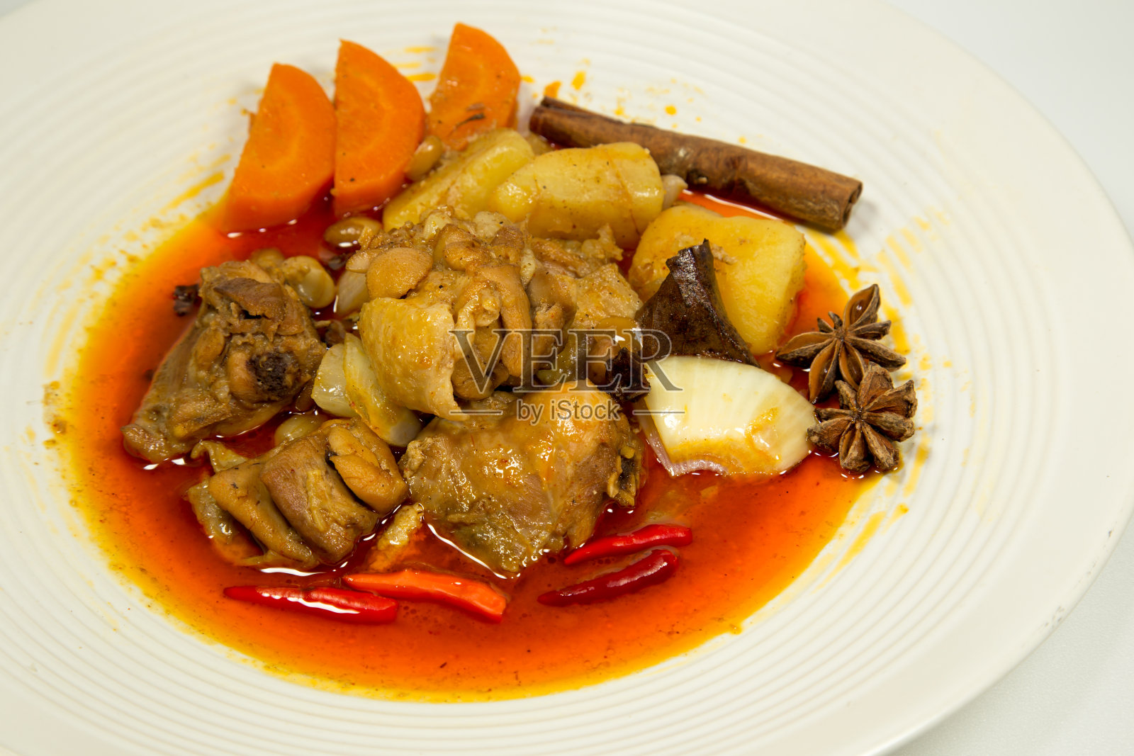 麻辣鸡肉咖喱白背景照片摄影图片