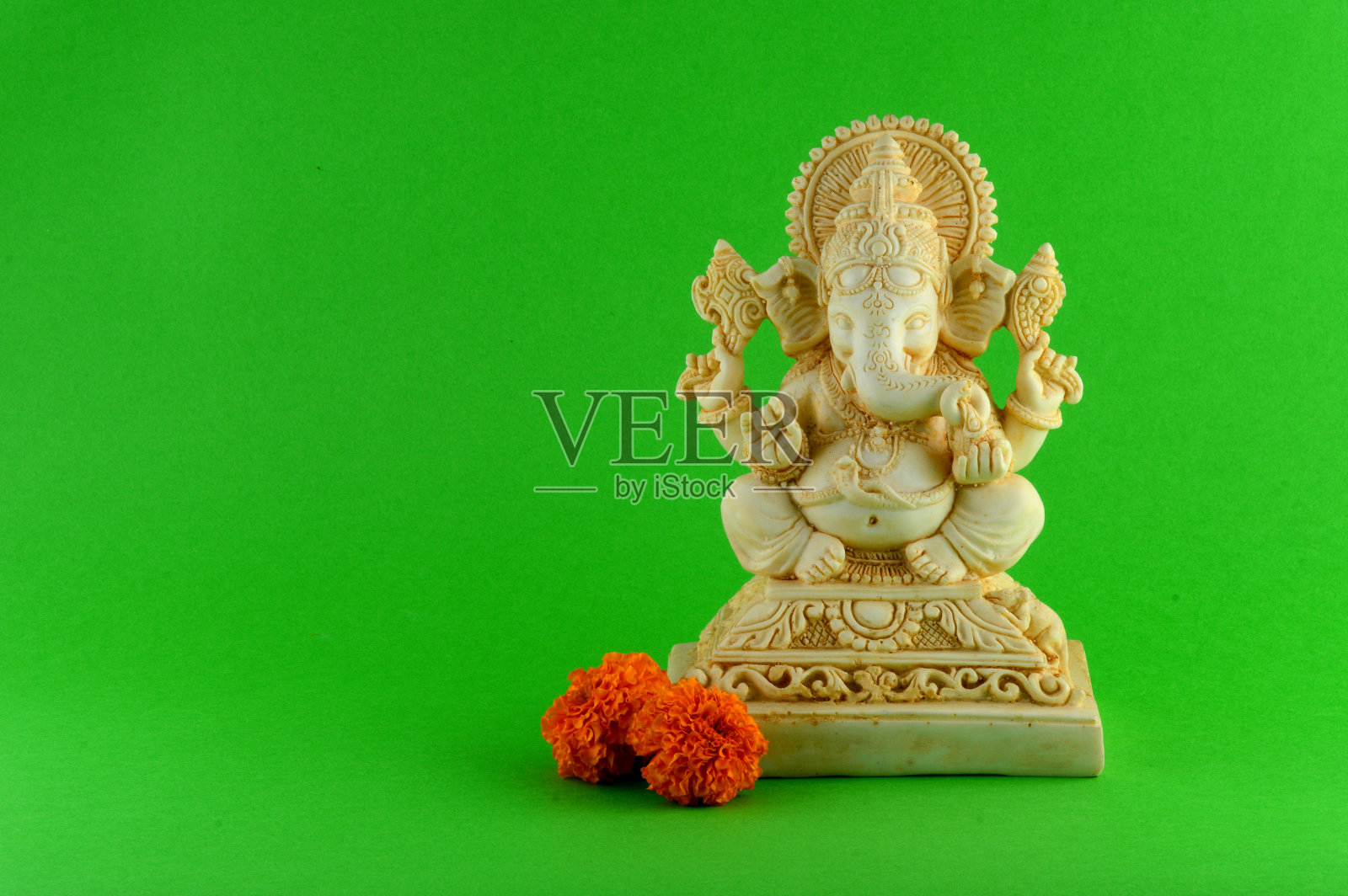 印度教神甘尼萨。甘尼萨的偶像。照片摄影图片