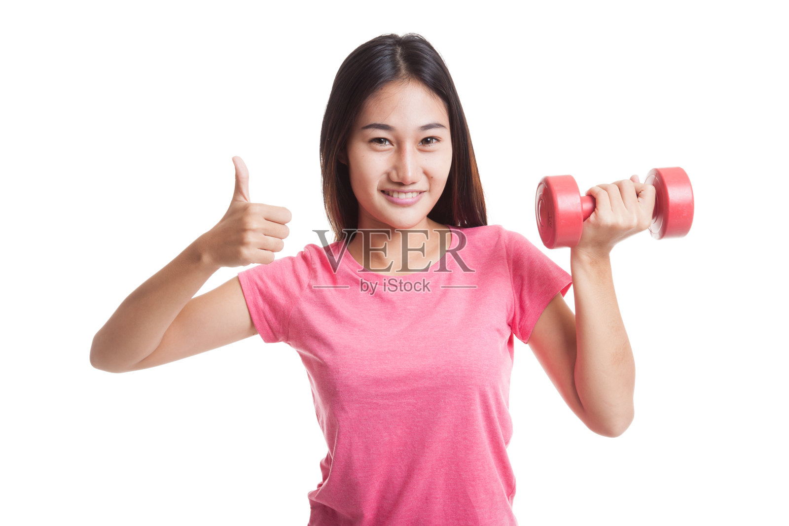 健康的亚洲女性用哑铃竖起大拇指照片摄影图片