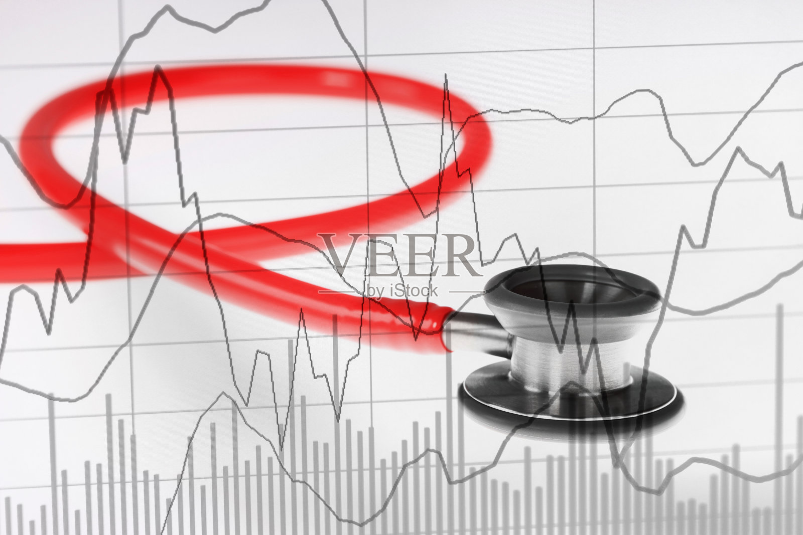 带图表的红色听诊器。照片摄影图片