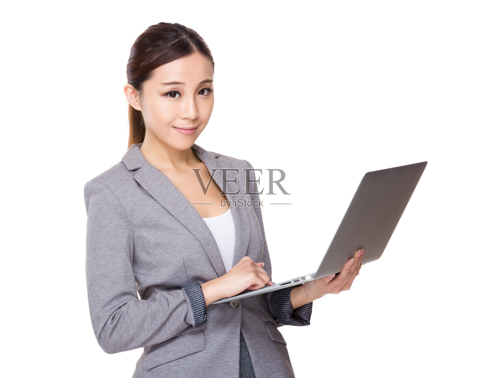 用笔记本电脑的女商人照片摄影图片