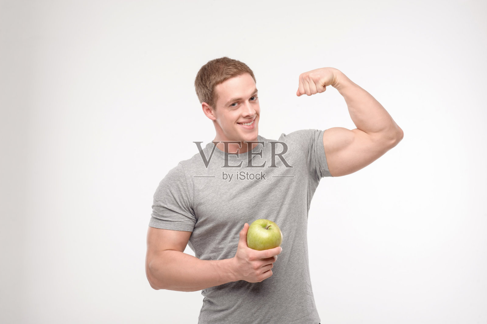 拿苹果的运动员照片摄影图片