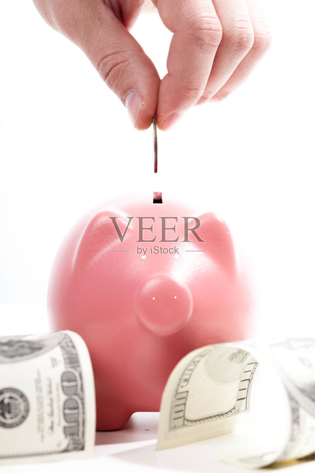 储蓄-储蓄罐和手硬币照片摄影图片