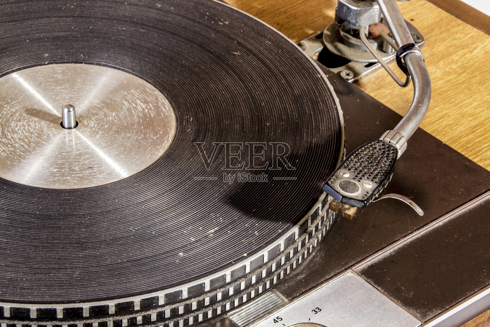 近距离的Vintage Grungy唱片播放转盘照片摄影图片