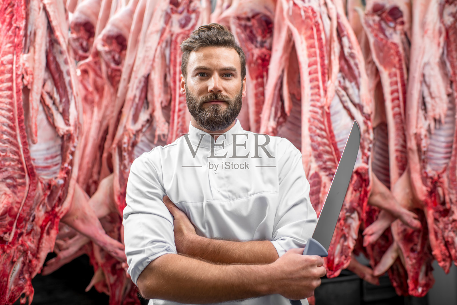 肉制品加工厂屠夫的肖像照片摄影图片