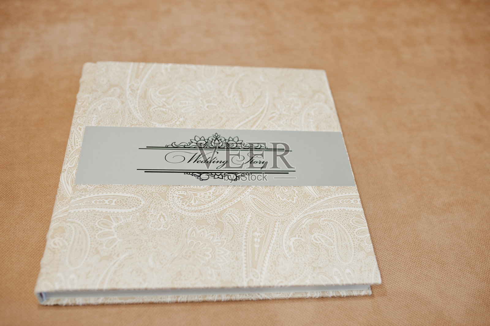 优雅的婚礼相册和相册，米色材料。照片摄影图片