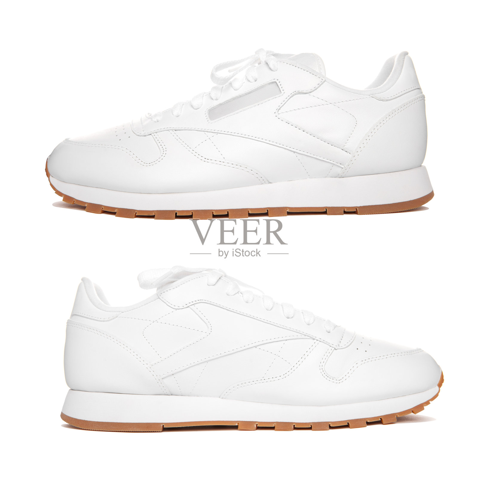 一双白色运动鞋的隔离照片照片摄影图片